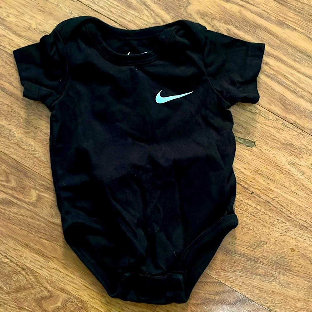 Gently used baby boy or girl onesie